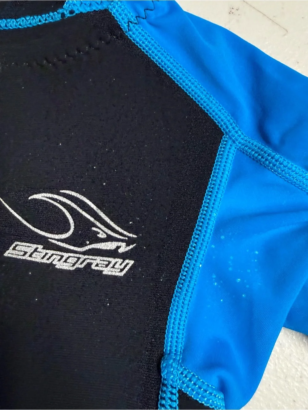 Aqua Sphere Stingray Kids Black and Bright Blue Short Sleeve Wetsuit Front Zip